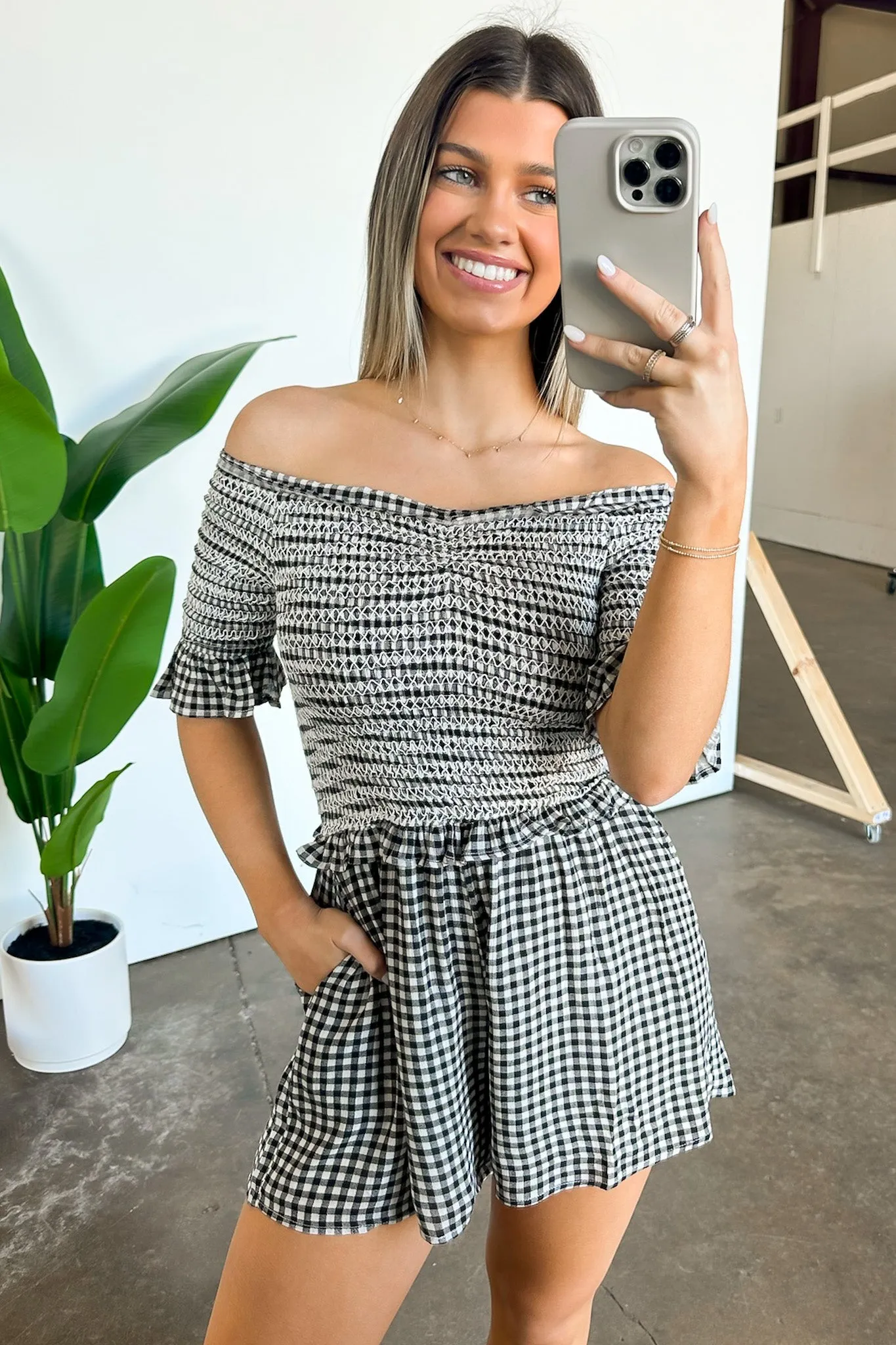 Dylan Off Shoulder Plaid Smocked Romper sold by Madison + Mallory