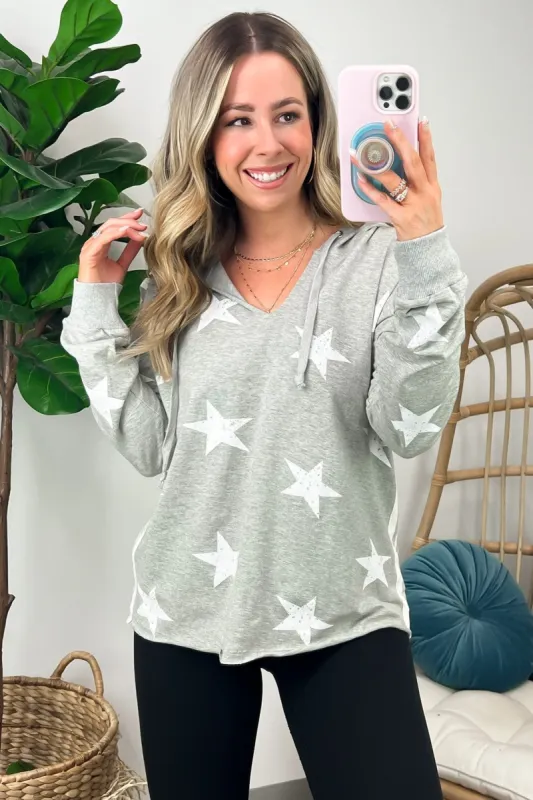 Kella Star Print Hooded Top sold by Madison + Mallory