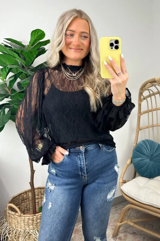 Cue the Chic Lace Puff Poet Sleeve Top sold by Madison + Mallory
