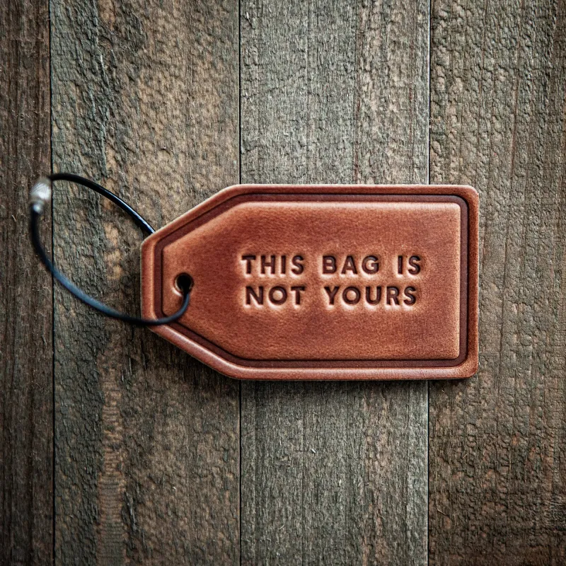 This Bag Is Not Yours Leather Luggage Tag made by Oceanne