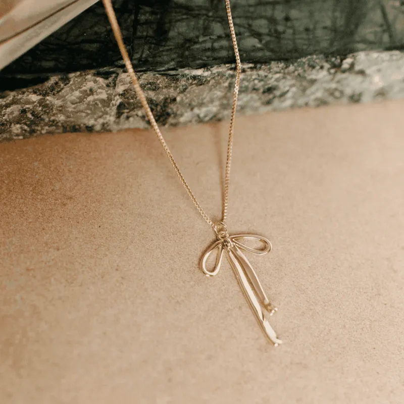 Louise Bow Necklace - Gold or Silver made by Oceanne
