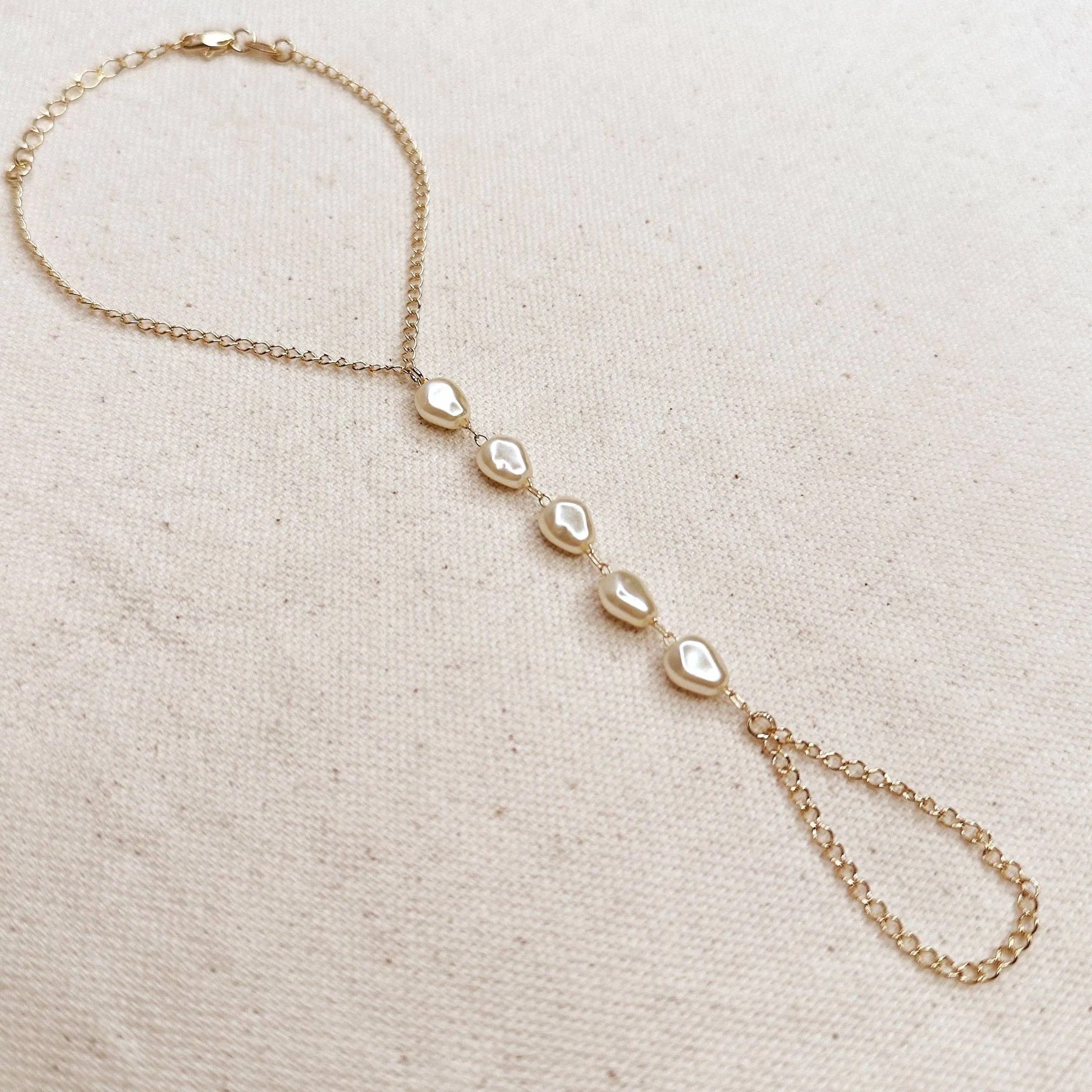 Baroque Pearl Hand Chain sold by Oceanne