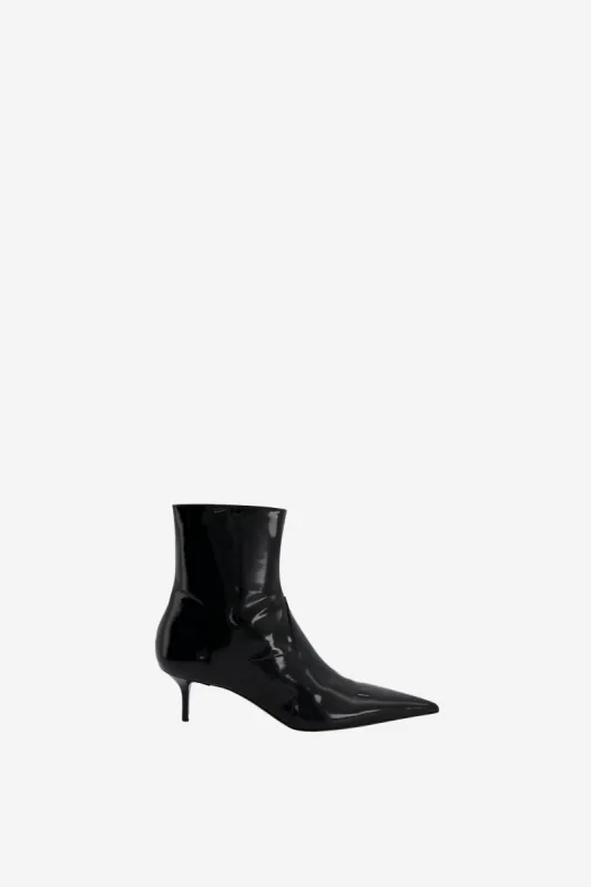 Patent Star Cut-Out Low Boots sold by Coperni Paris