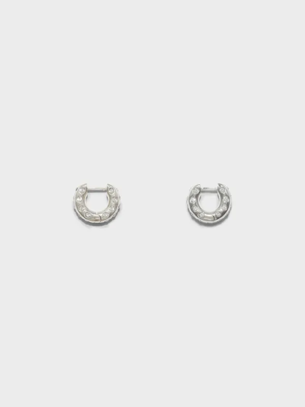 Alto Crystal and Palladium-Plated Hoop Earrings sold by Aeyde