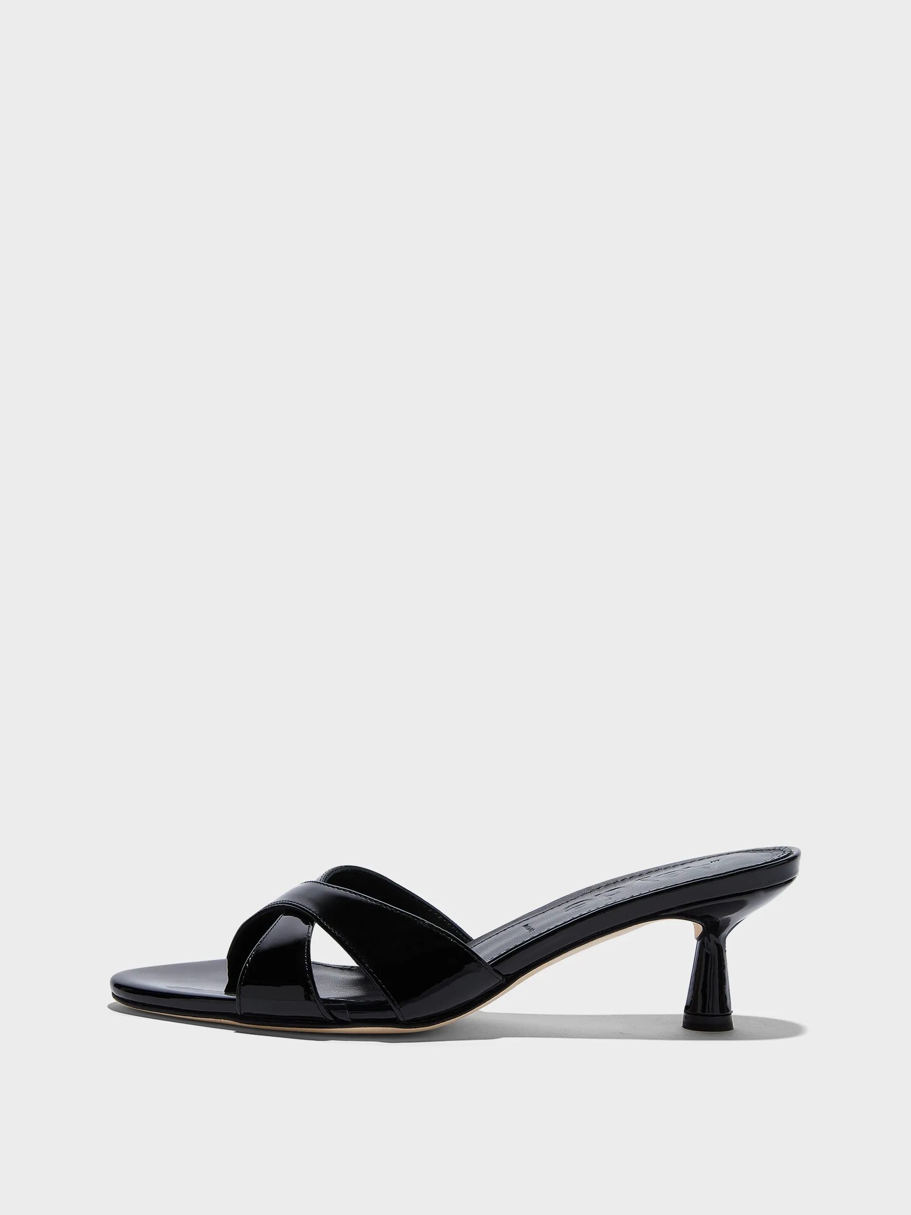 Vero Patent Leather Mules sold by Aeyde