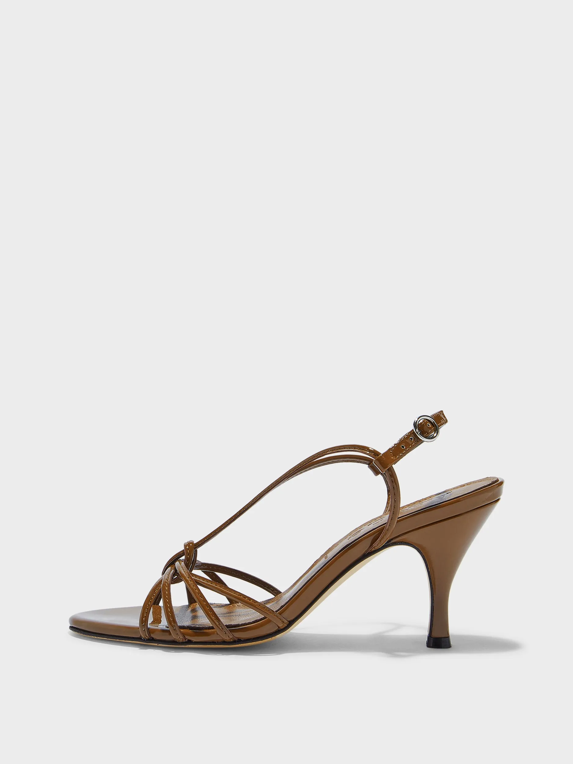 Solange Patent Leather Sandals sold by Aeyde