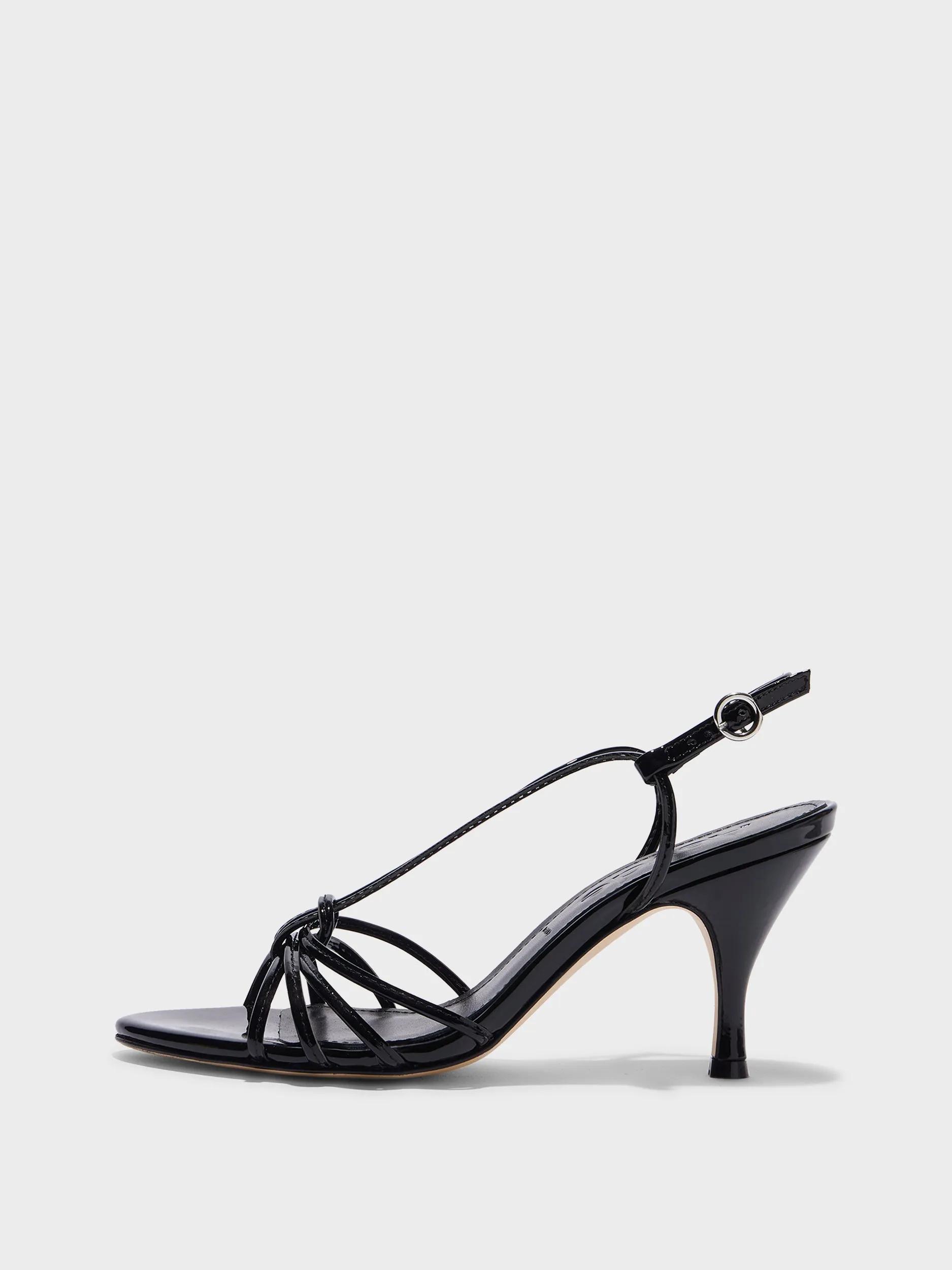 Solange Patent Leather Sandals sold by Aeyde