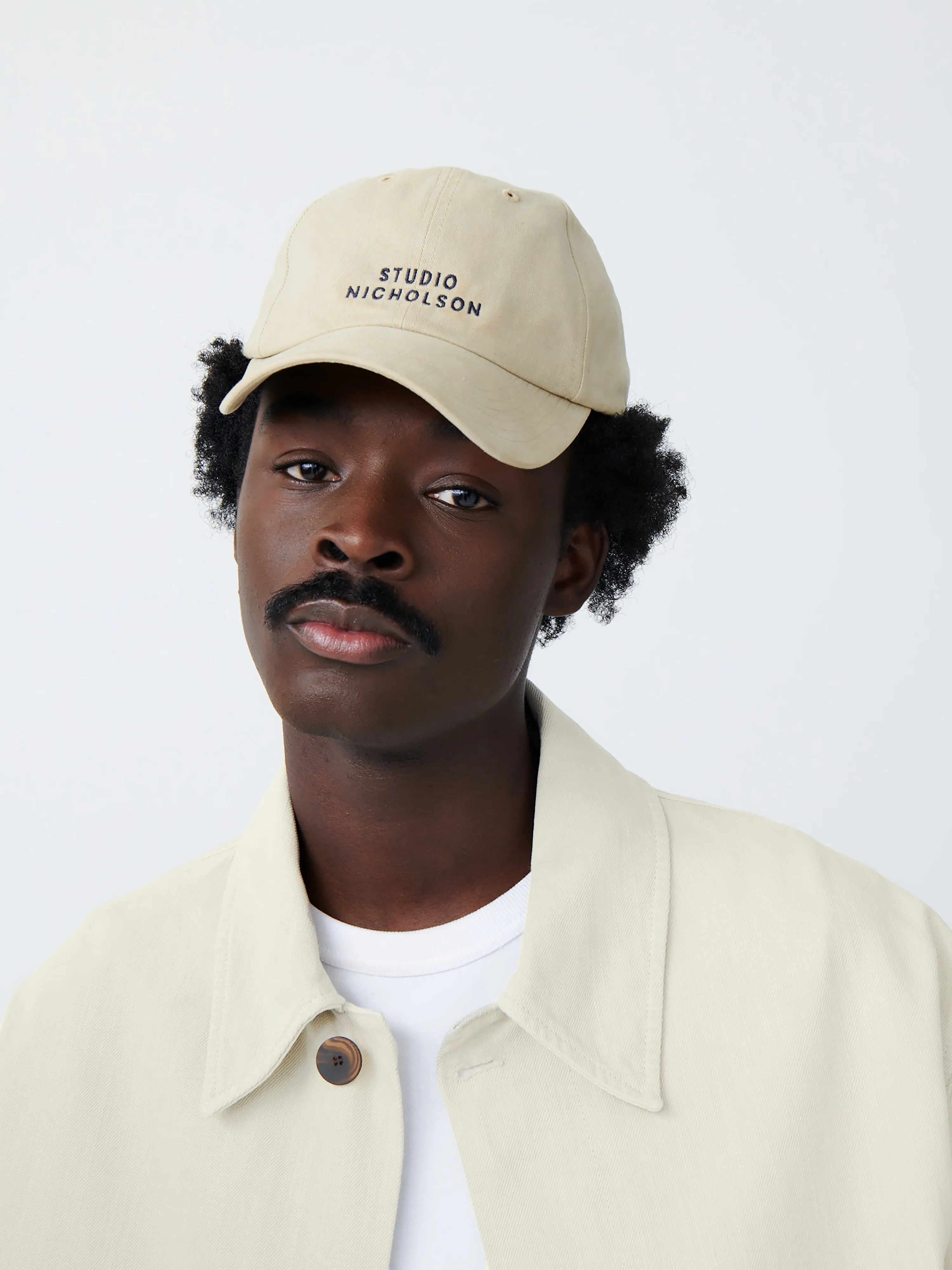 Logo Cap in Sand sold by Studio Nicholson product image thumbnail 4