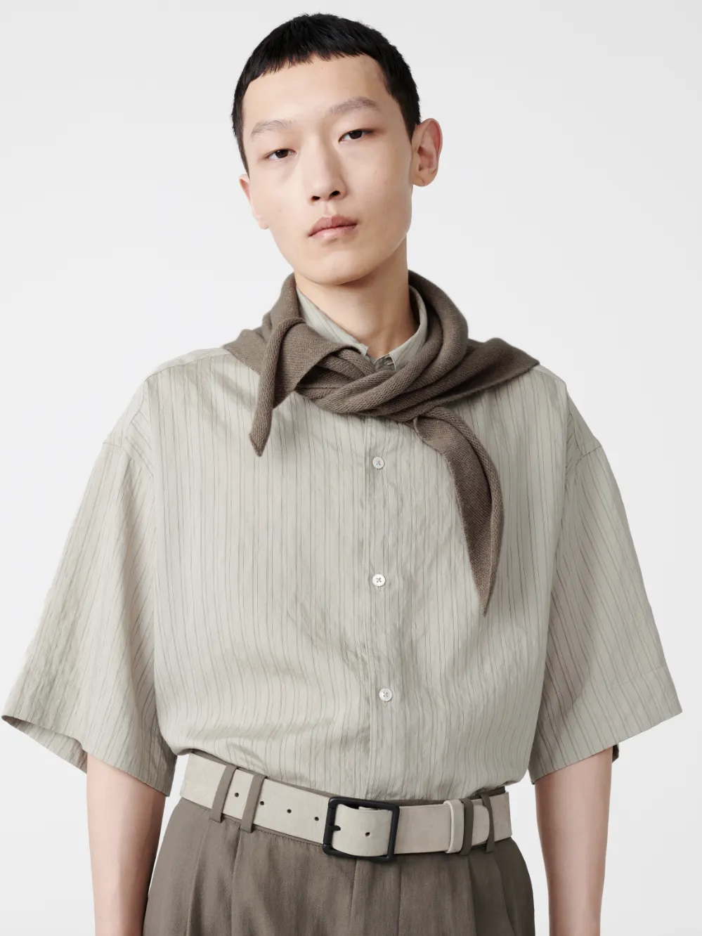 Trigon Scarf in Stone Melange sold by Studio Nicholson