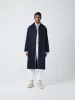 Marque Coat in Dark Navy sold by Studio Nicholson