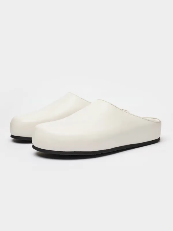 Women's Wearing Clog in Milk made by Studio Nicholson