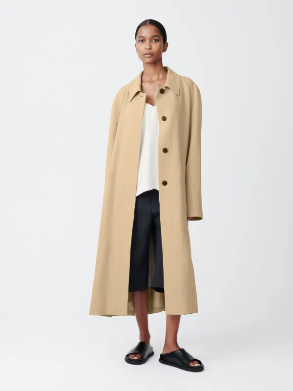 Denali Coat in Sand sold by Studio Nicholson