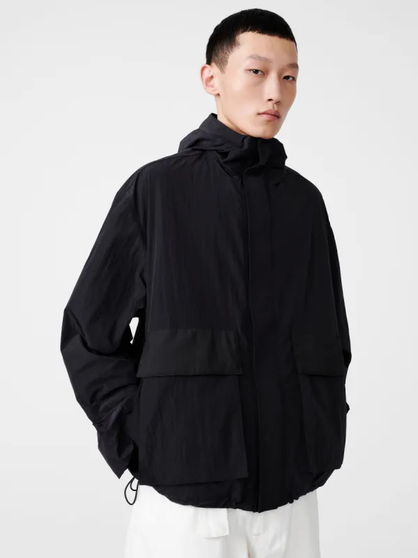 Lessen Jacket in Black made by Studio Nicholson