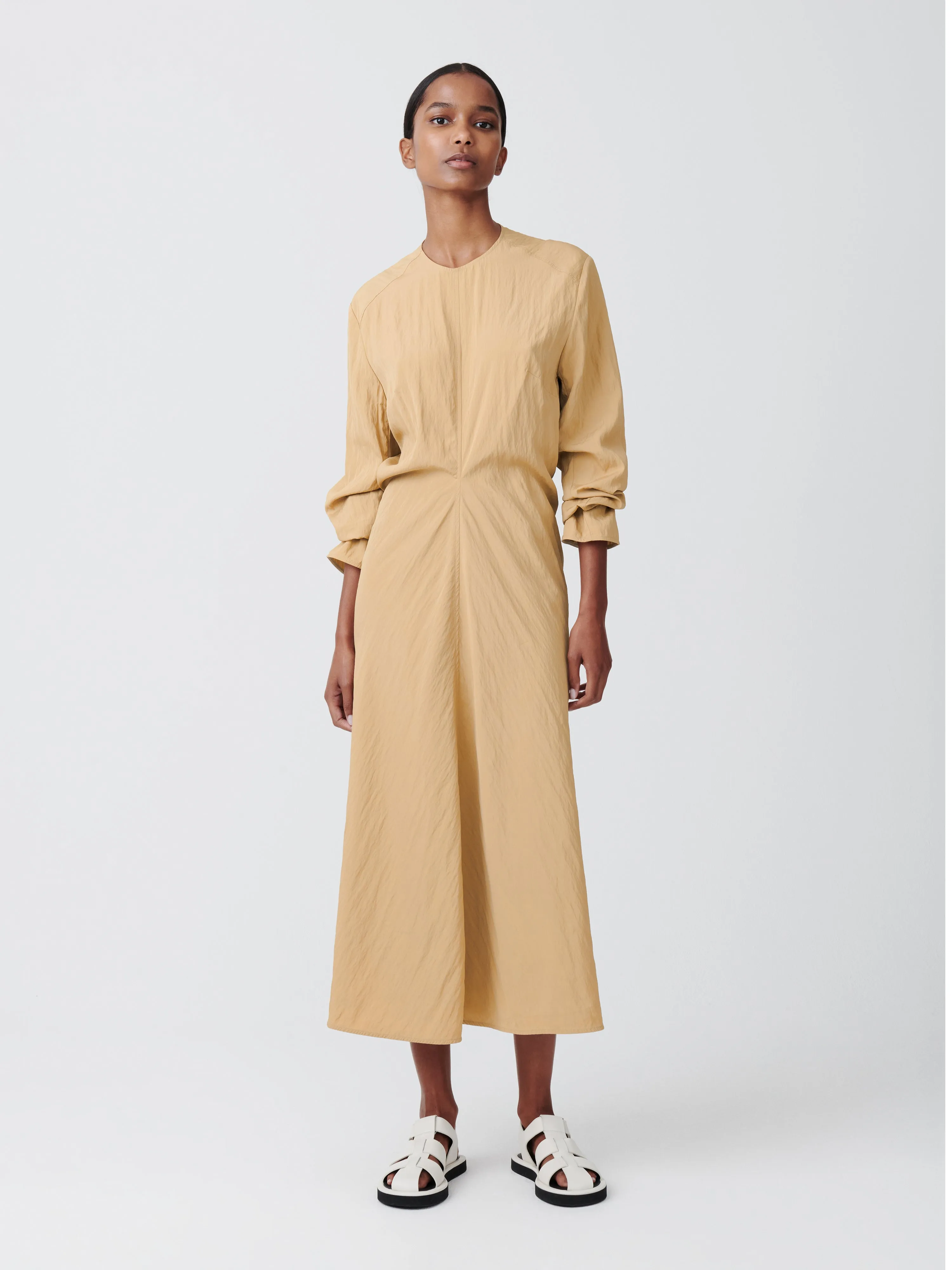 Welles Dress in Sand sold by Studio Nicholson