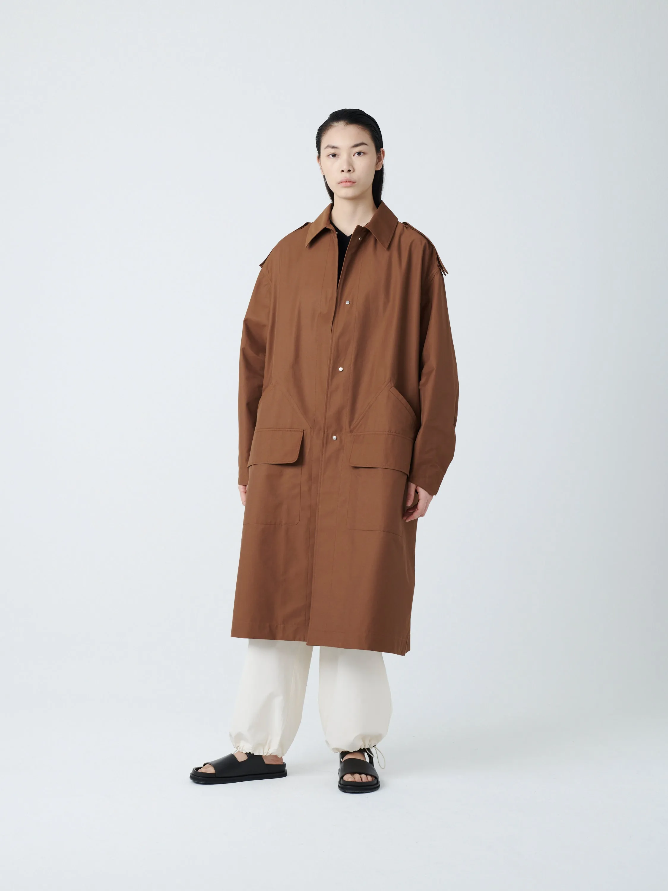 Diphu Coat in Madras sold by Studio Nicholson