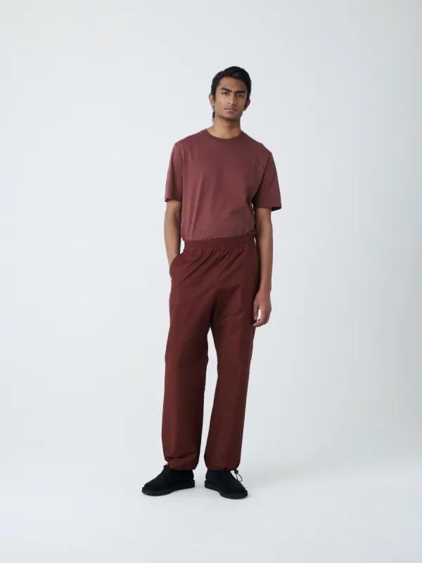 Zephyr Coated Cotton Pant in Chestnut sold by Studio Nicholson