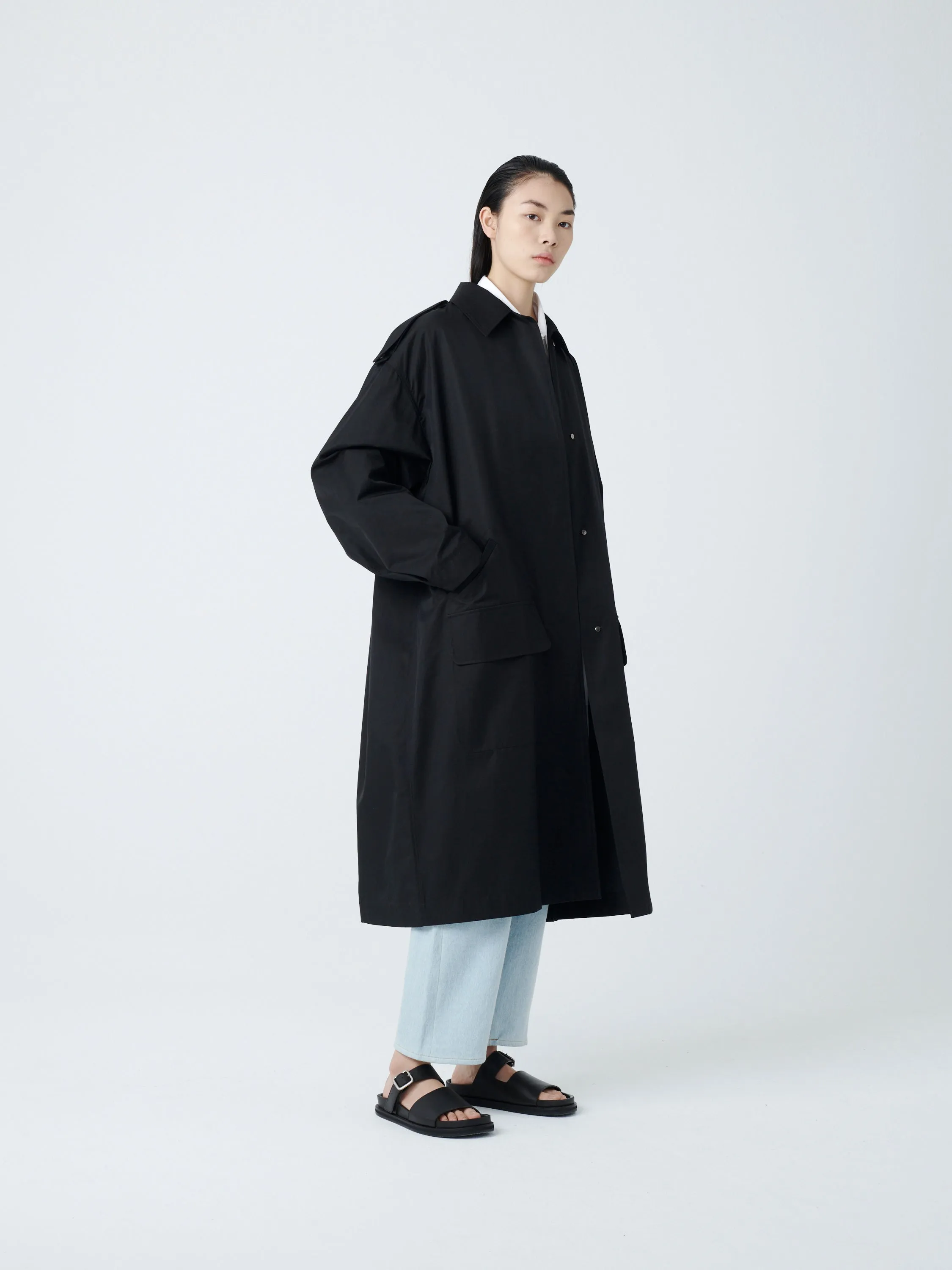 Diphu Coat in Black sold by Studio Nicholson product image thumbnail 2