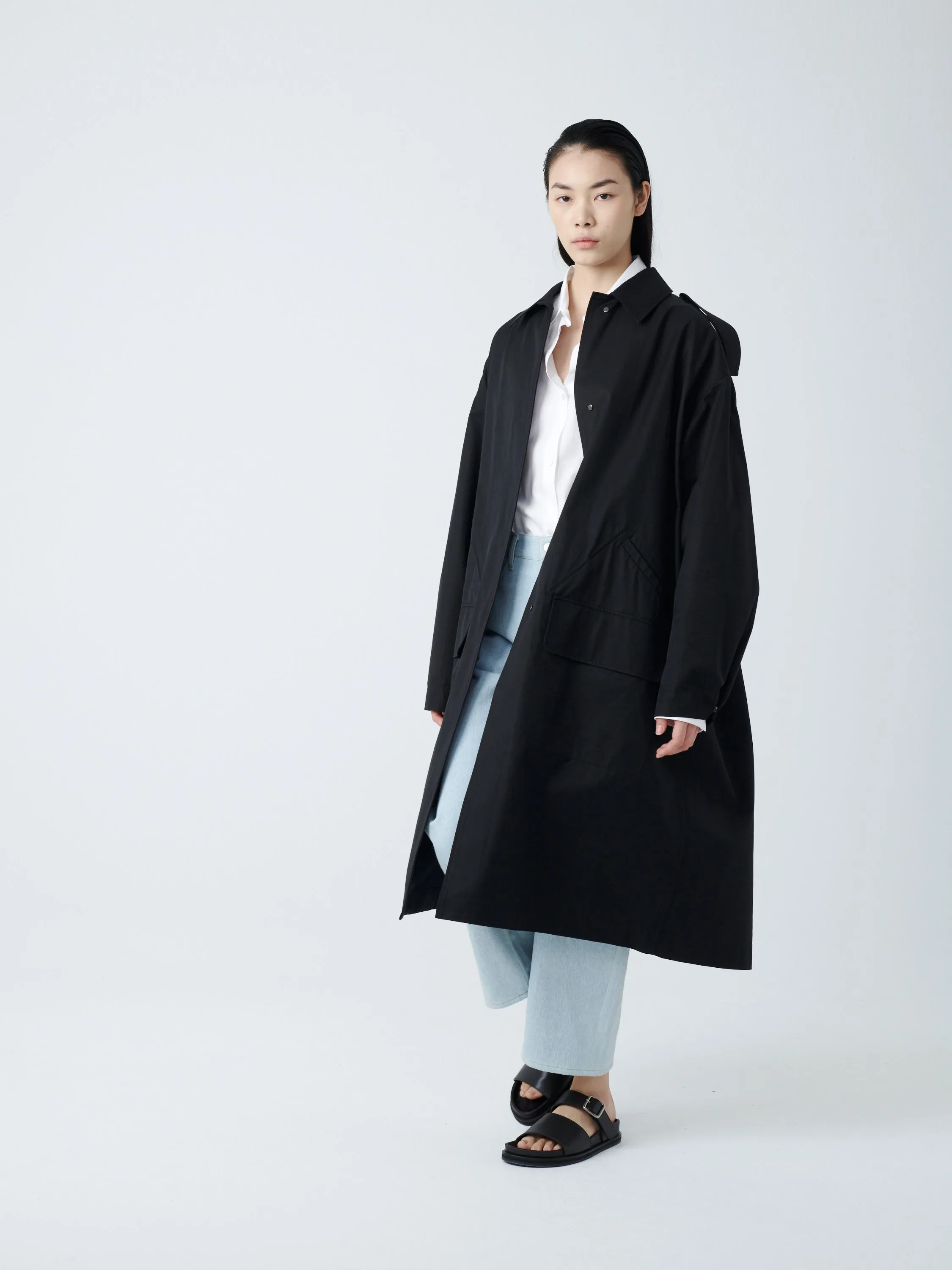Diphu Coat in Black sold by Studio Nicholson product image thumbnail 5