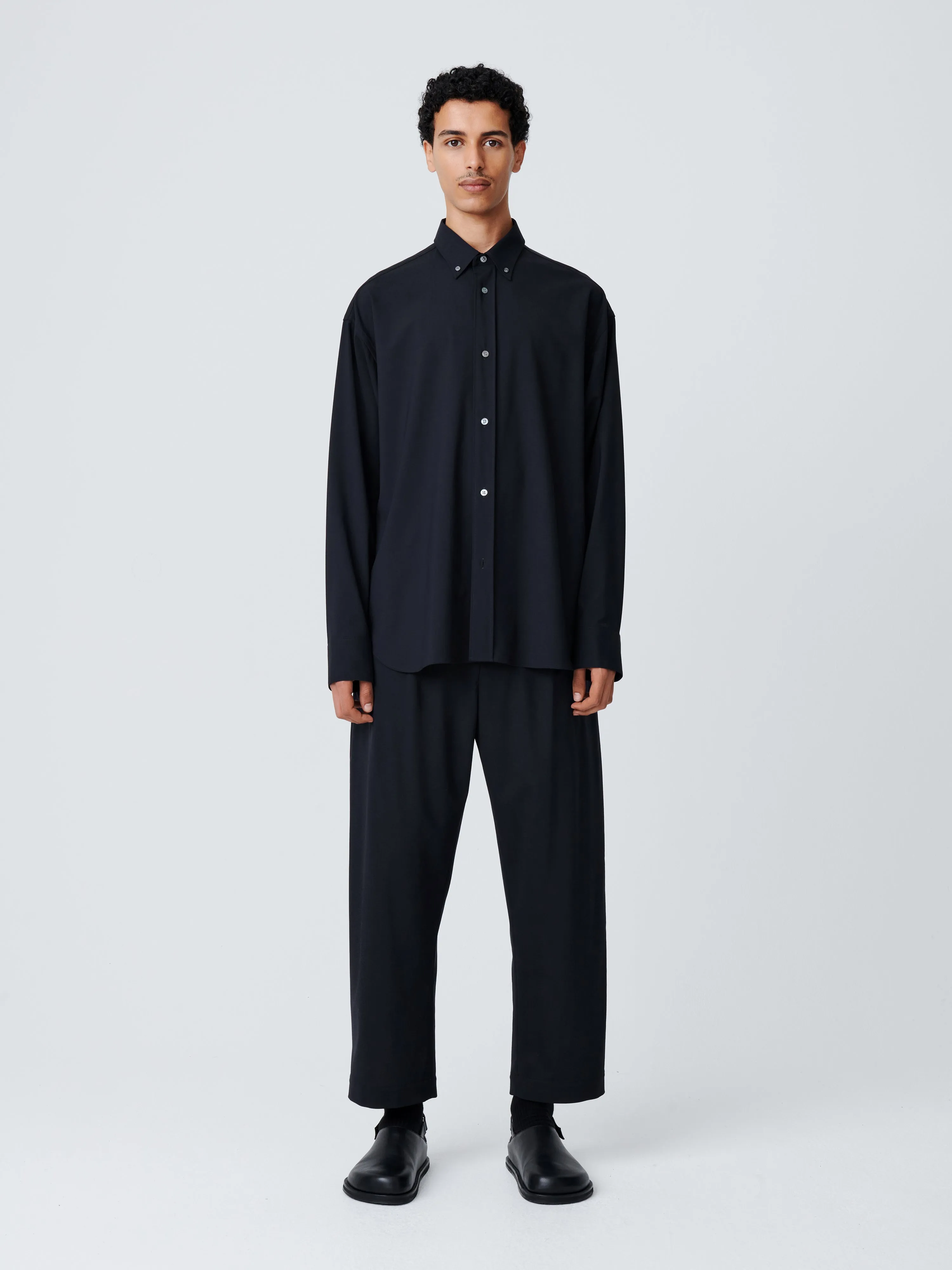 Tuck Tropical Wool Pant in Darkest Navy sold by Studio Nicholson