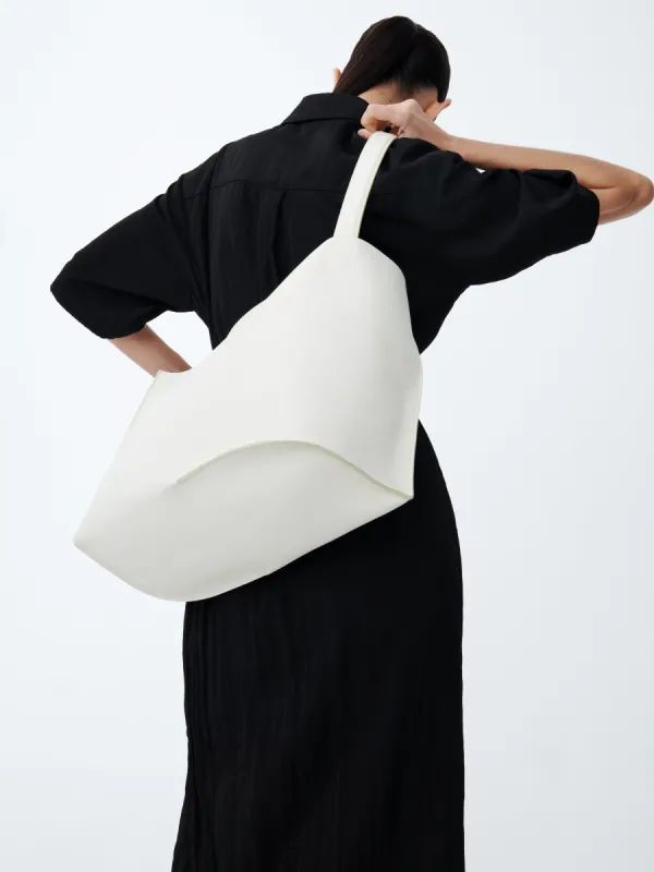 Doublet Leather Bag in Parchment sold by Studio Nicholson