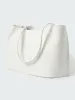 Doublet Leather Bag in Parchment sold by Studio Nicholson