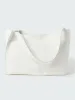Doublet Leather Bag in Parchment sold by Studio Nicholson