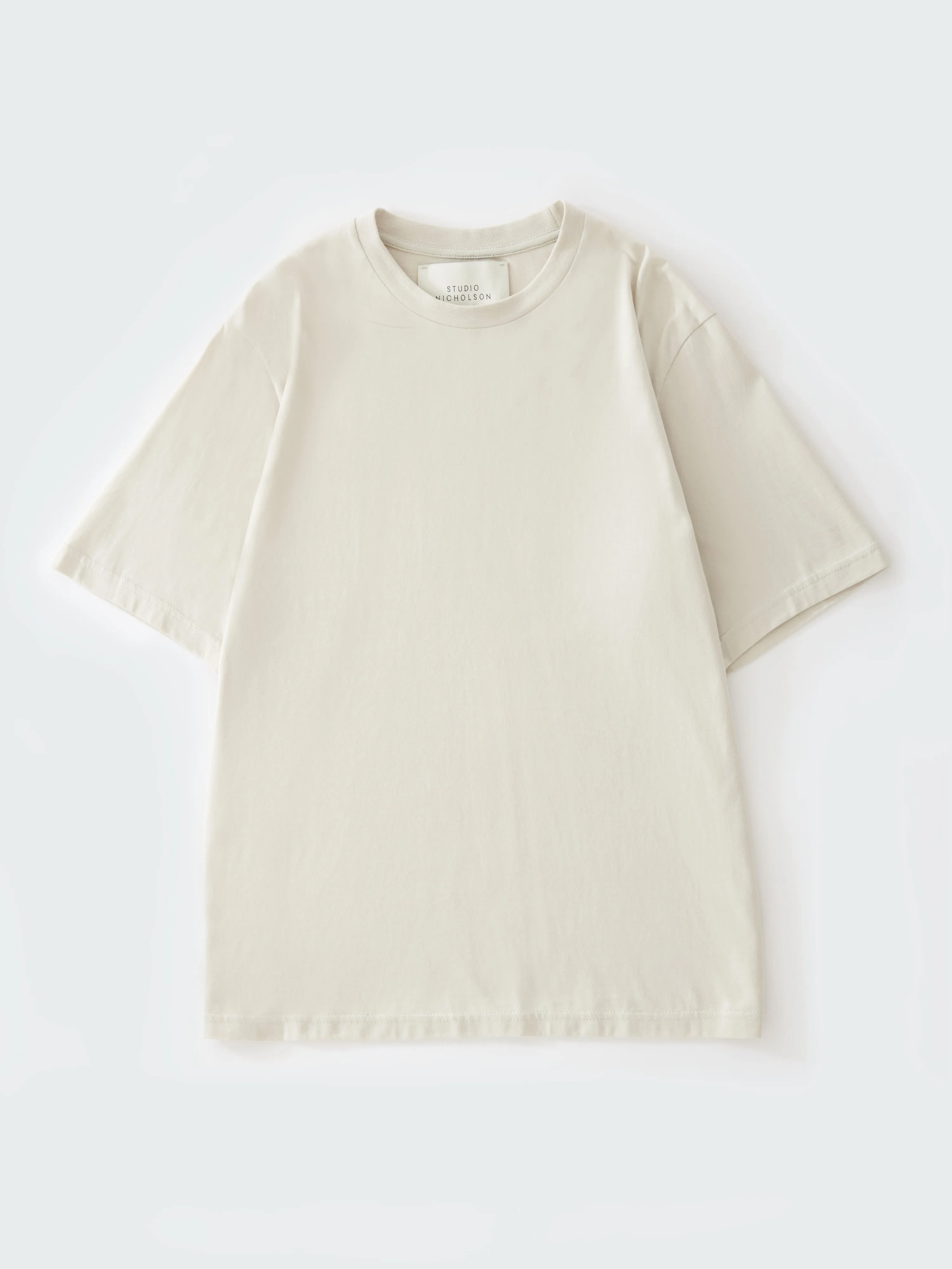 Bric T-Shirt in Dove sold by Studio Nicholson