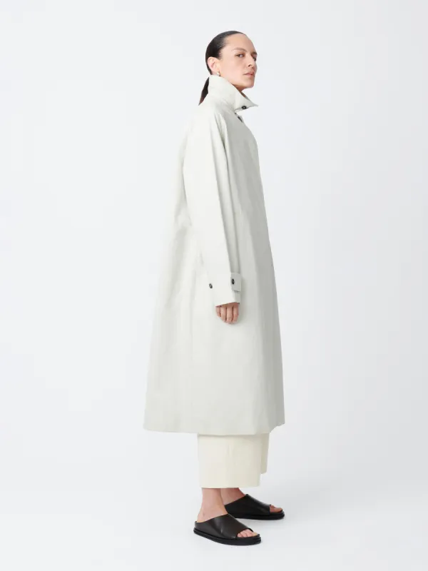 Holin Coated Cotton Coat in Dove sold by Studio Nicholson