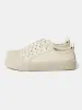 Byrd Canvas Shoe in Dove sold by Studio Nicholson