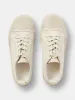 Byrd Canvas Shoe in Dove sold by Studio Nicholson
