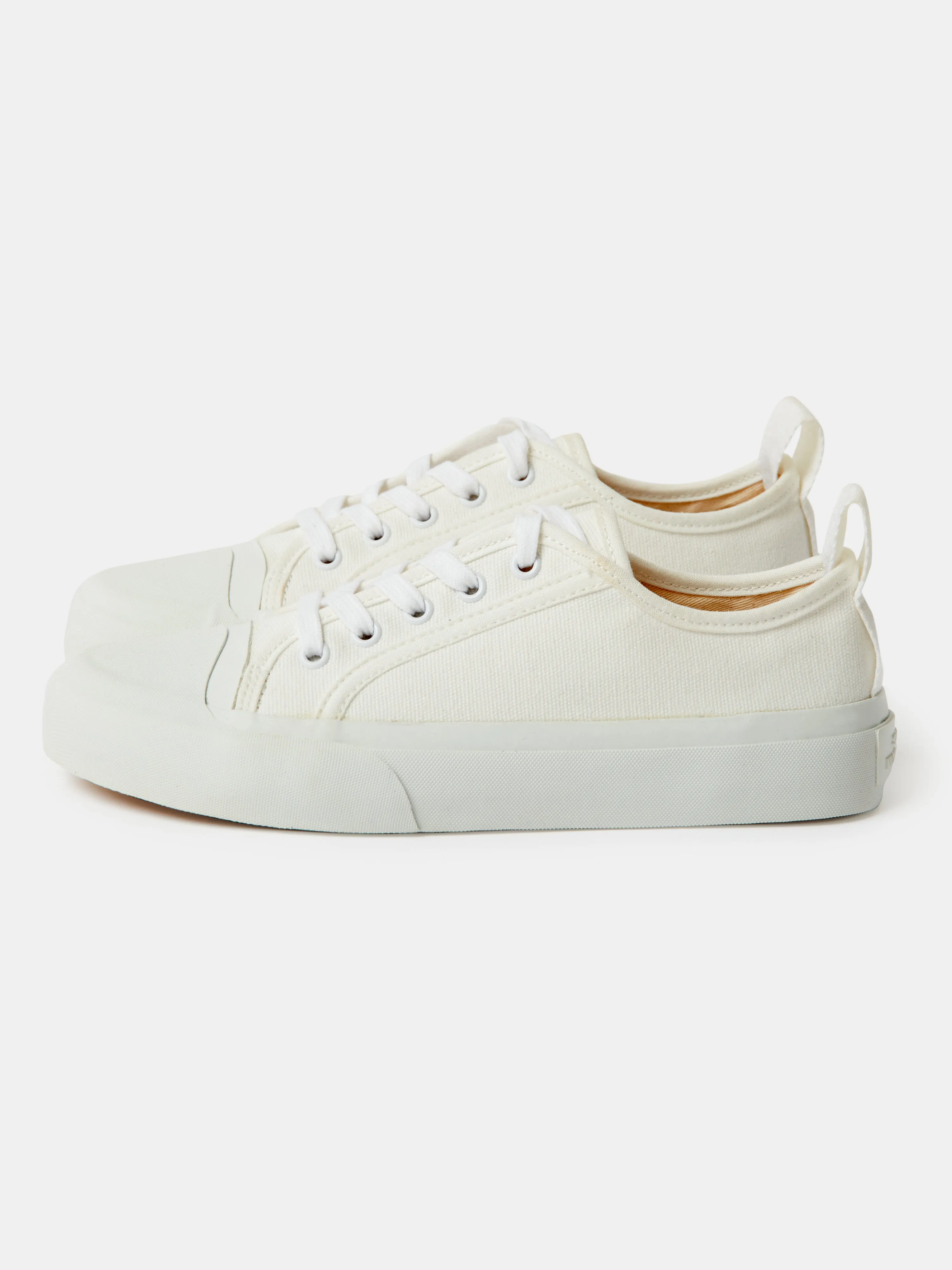 Byrd Canvas Shoe in Cream sold by Studio Nicholson product image thumbnail 2