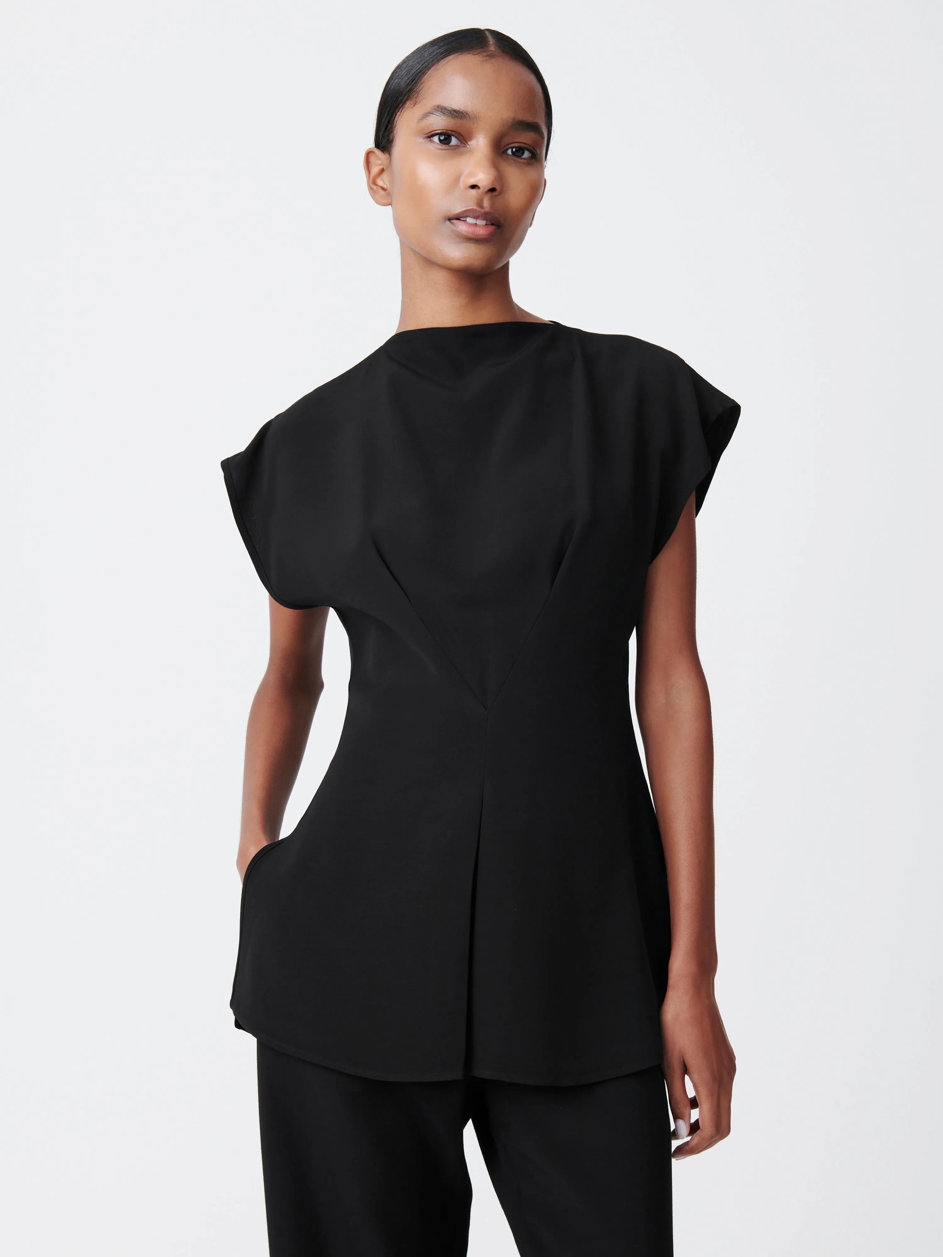 Damer Top in Black sold by Studio Nicholson