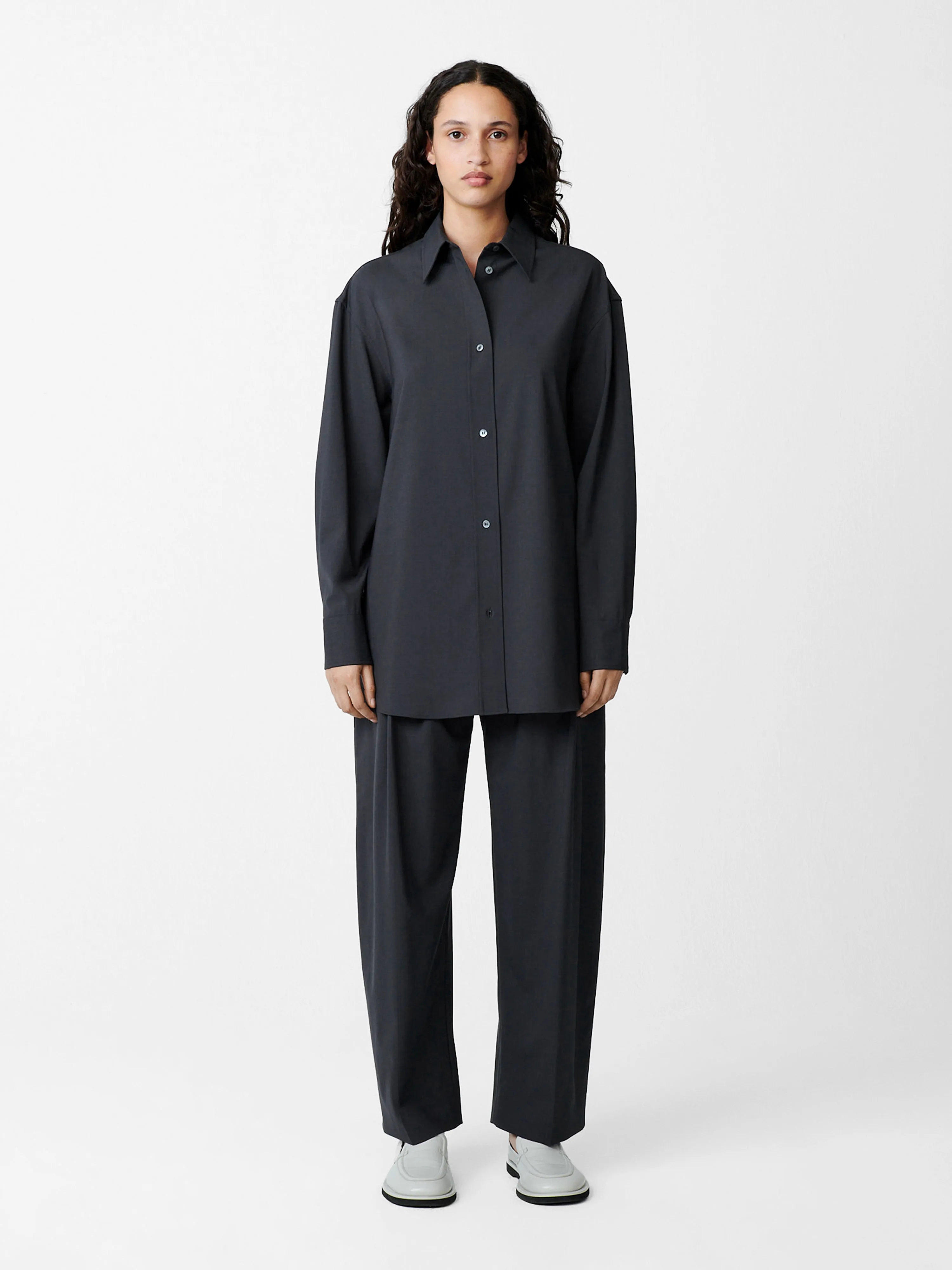 Acuna Tropical Wool Pant in Seal Blue sold by Studio Nicholson