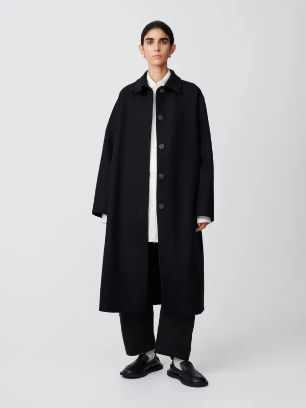 Ria Coat in Black sold by Studio Nicholson