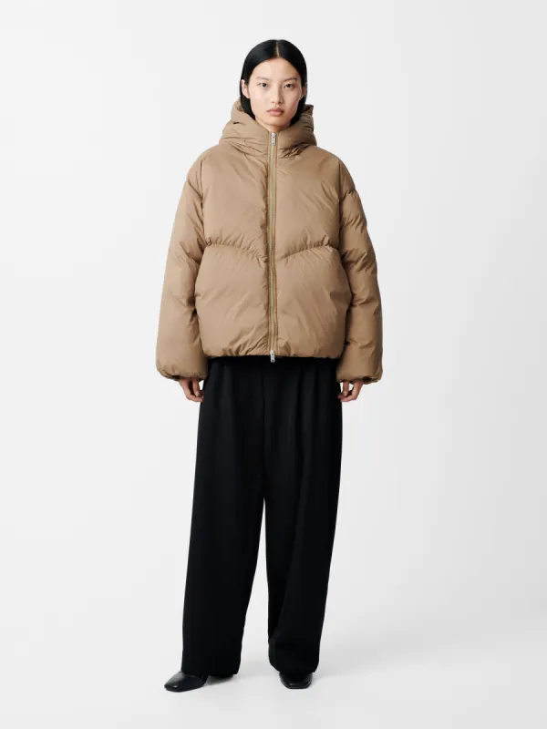 Dana Down Jacket in Beige sold by Studio Nicholson