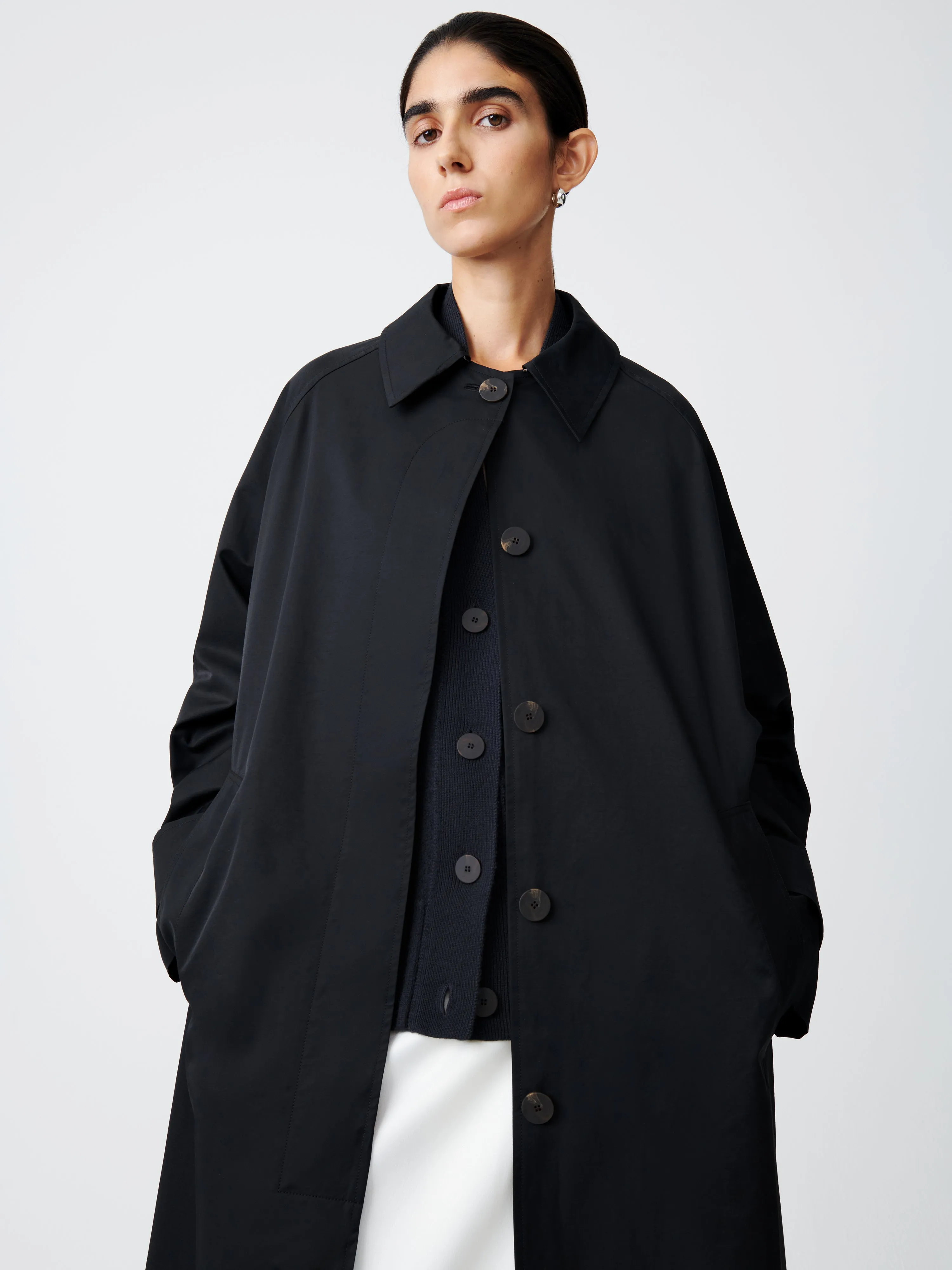 Holin Coated Cotton Coat in Black sold by Studio Nicholson product image thumbnail 4