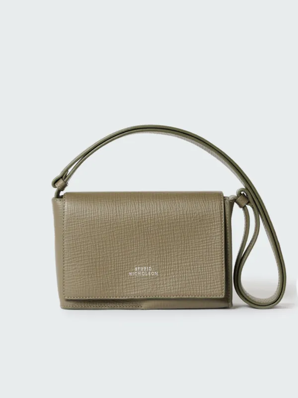 Meshi Mini Leather Bag in Elephant sold by Studio Nicholson