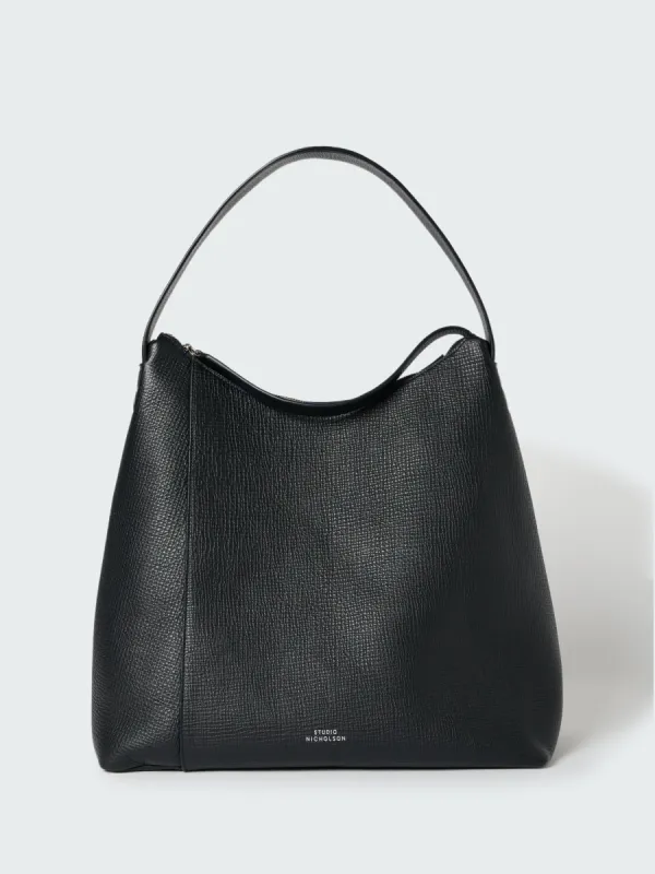 Hobo Type 1 Leather Bag in Darkest Navy made by Studio Nicholson