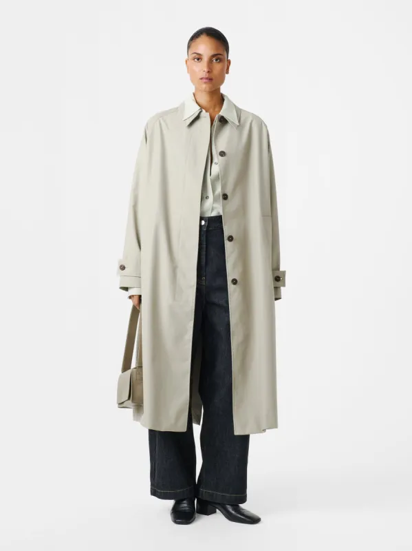 Holin Coated Cotton Coat in Soap sold by Studio Nicholson