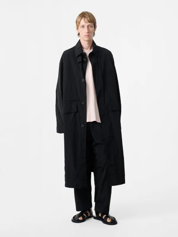 Rizz Coat in Black sold by Studio Nicholson