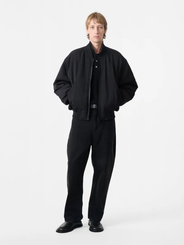 Blade Bomber Jacket in Black made by Studio Nicholson