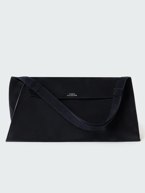 Shiboru Suede Bag in Darkest Navy sold by Studio Nicholson