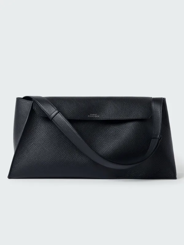 Shiboru Leather Bag in Darkest Navy made by Studio Nicholson