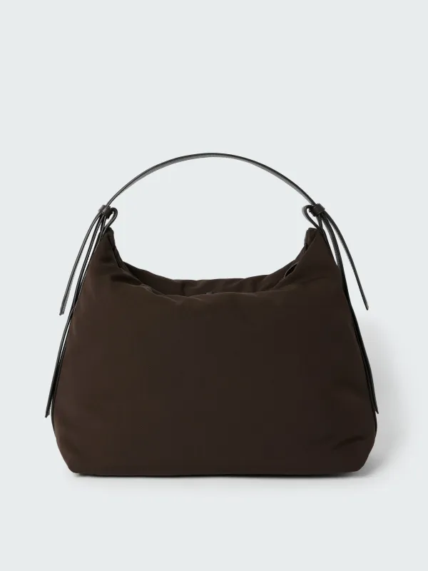 Transit Bag in Cocoa sold by Studio Nicholson