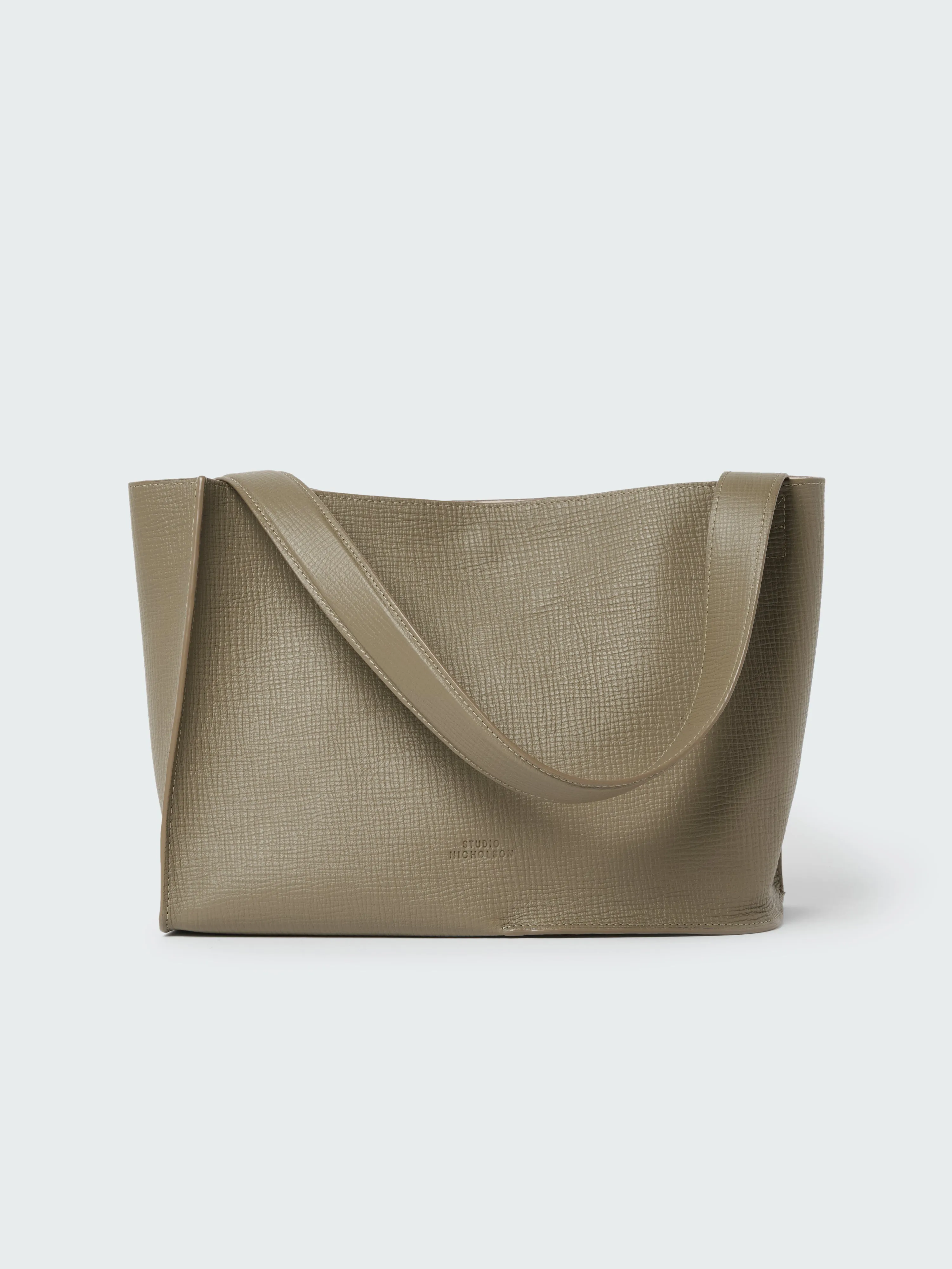 Doublet Leather Medi bag in Elephant sold by Studio Nicholson