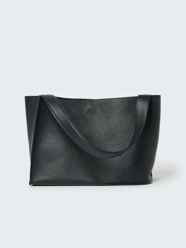 Doublet Leather Medi Bag in Darkest Navy made by Studio Nicholson