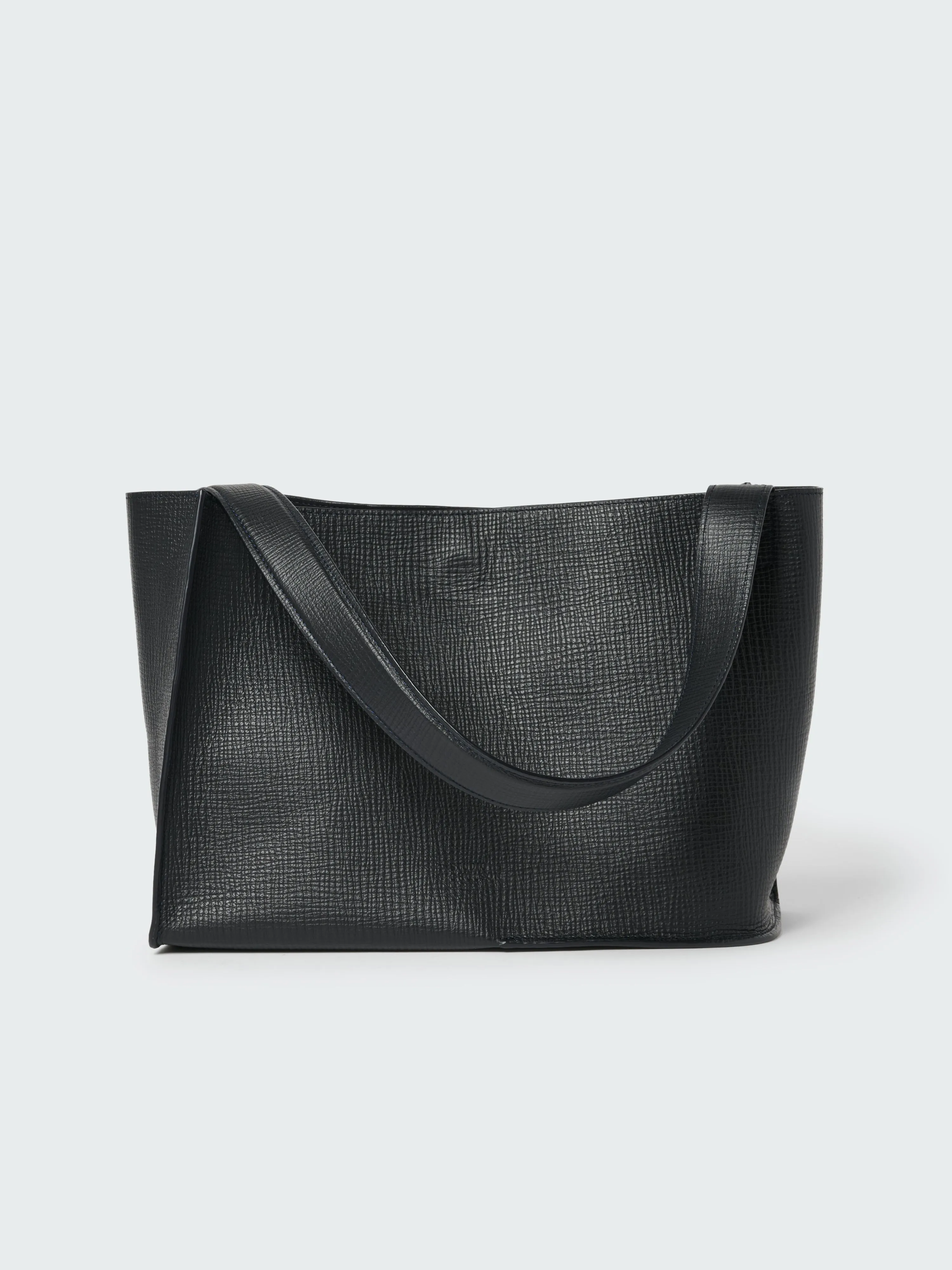 Doublet Leather Medi Bag in Darkest Navy sold by Studio Nicholson