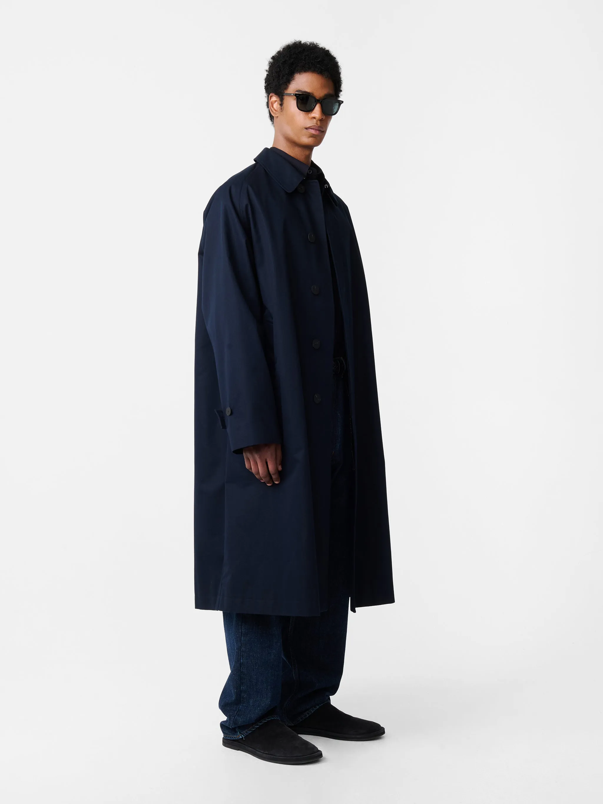 Crowe Coated Cotton Coat in Darkest Navy sold by Studio Nicholson