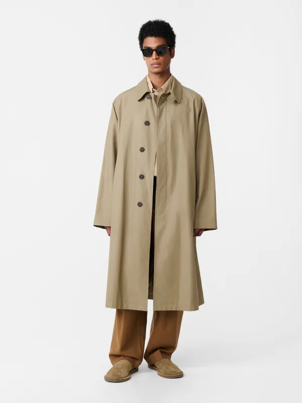 Crowe Coated Cotton Coat in Dark Dusk sold by Studio Nicholson