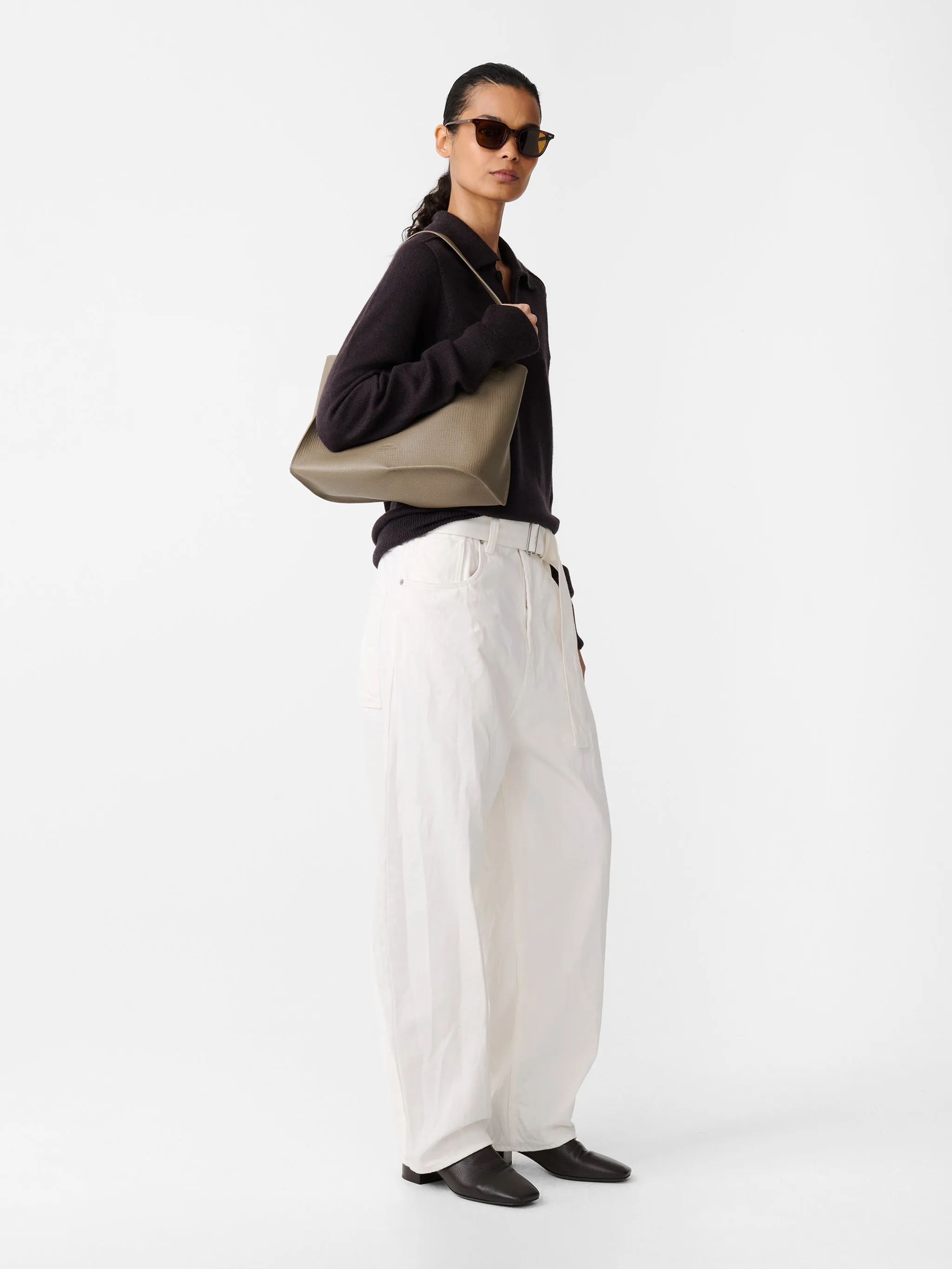 Cahun Crinkle Denim Pant in White sold by Studio Nicholson product image thumbnail 3